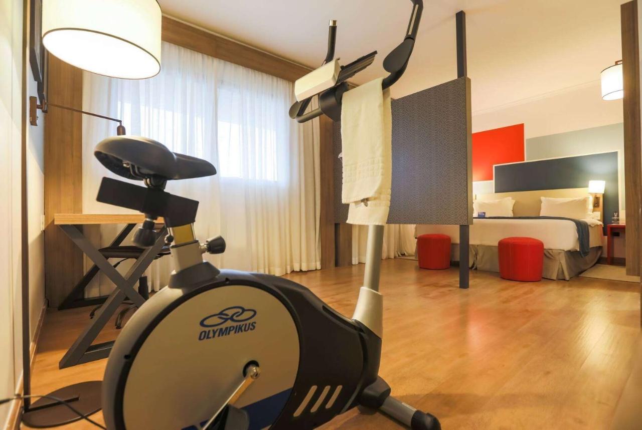 Hotel Tryp By Wyndham Ribeirão Preto Exteriér fotografie An exercise bike in a hotel room